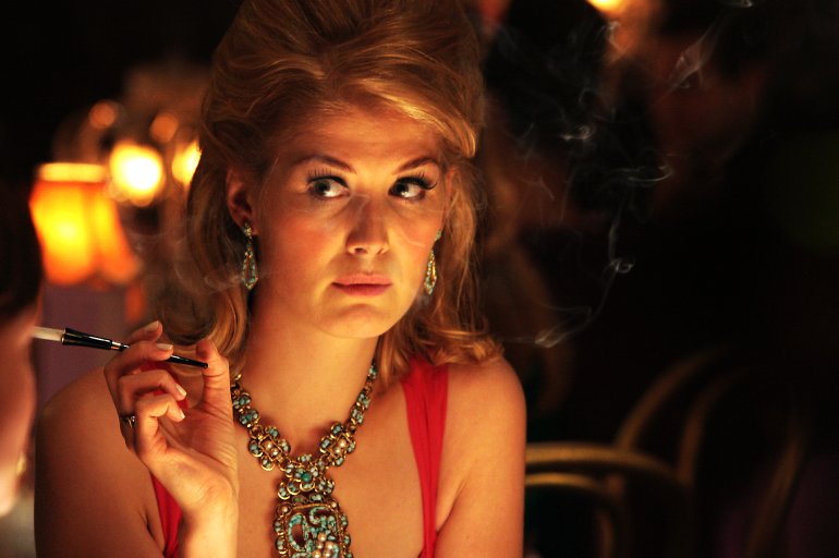 Non-smoking girl holding a cigarette in the casino