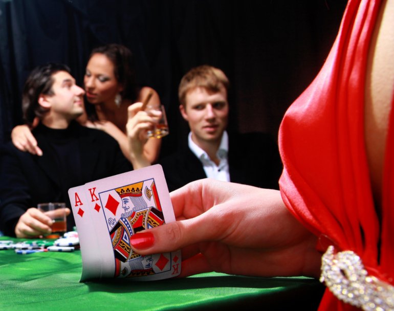 girl in red playing blackjack