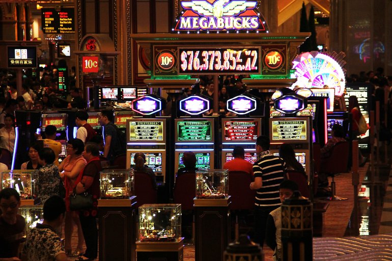 Players on the Megabucks slot machine