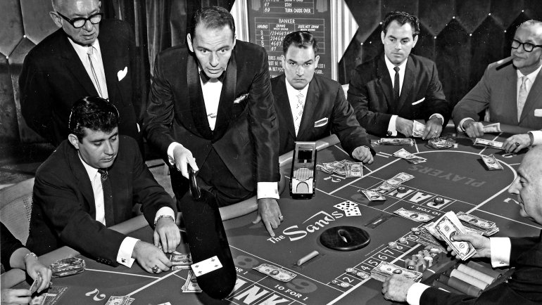 croupier at a table in the gambling casino baccarat Sands